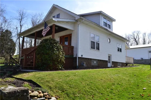 a front view of house with yard