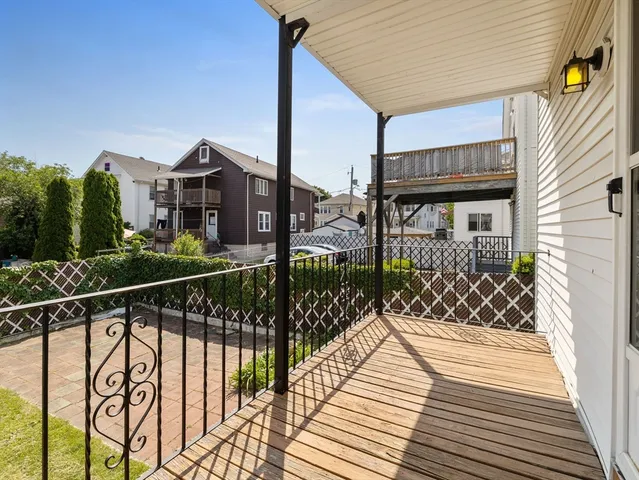 a view of a street with wooden stairs