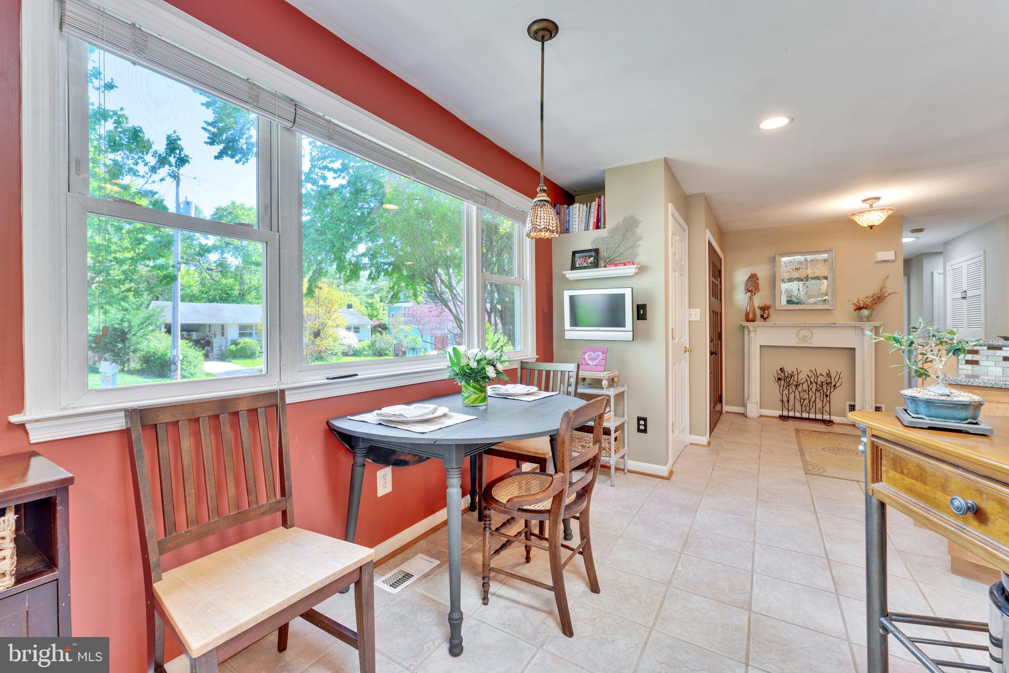 501 Ridge Road Southwest Vienna, VA 22180 - Photo 11 of 54 a view of a dining room with furniture window and outside view