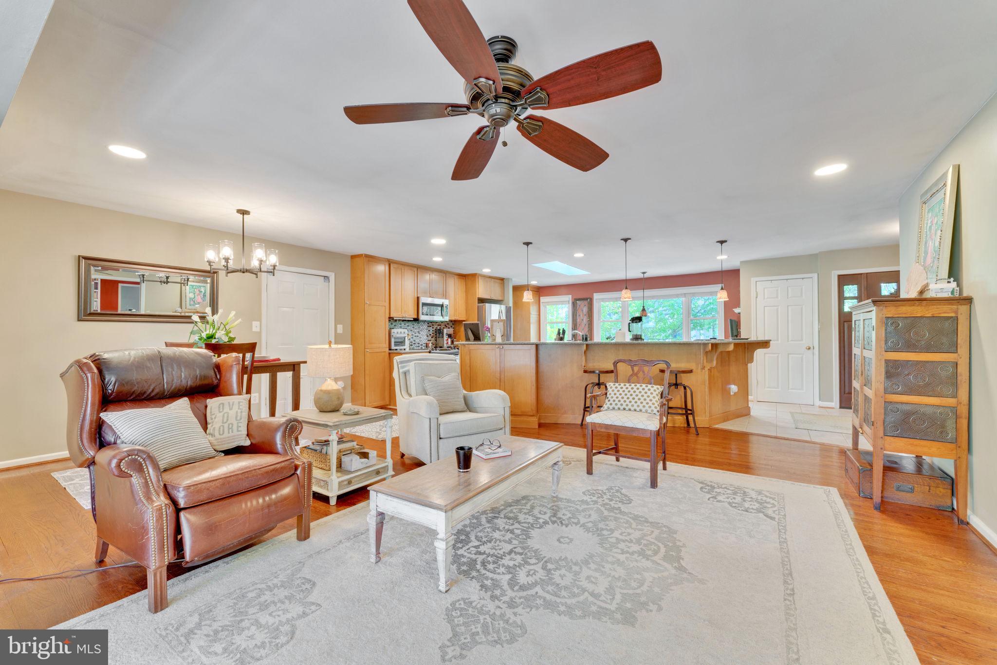 501 Ridge Road Southwest Vienna, VA 22180 - Photo 13 of 54 a living room with furniture kitchen view and a large window