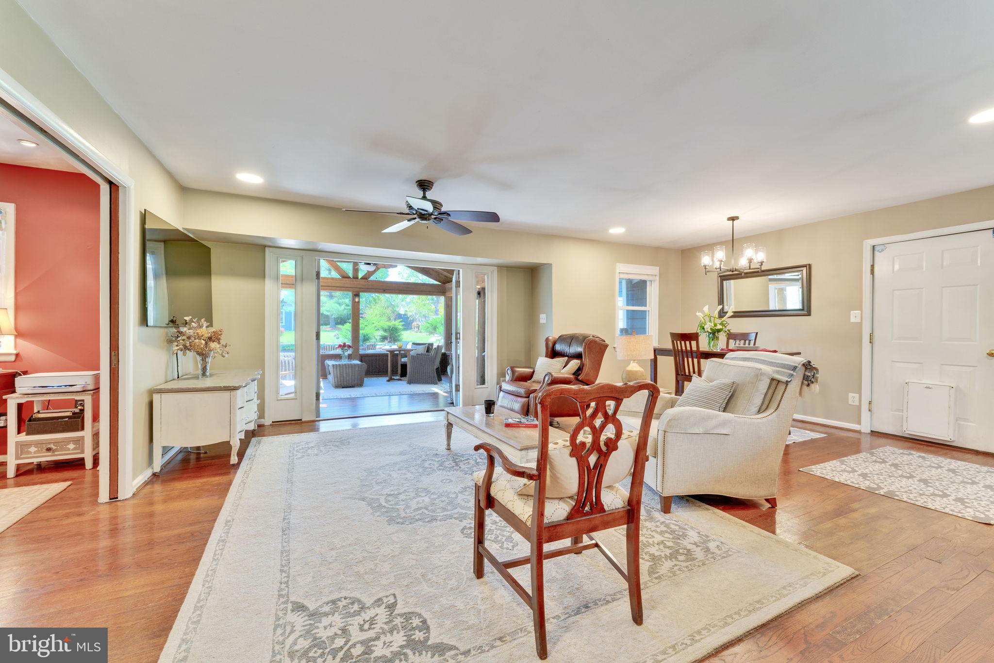 501 Ridge Road Southwest Vienna, VA 22180 - Photo 14 of 54 a living room with furniture and a large window