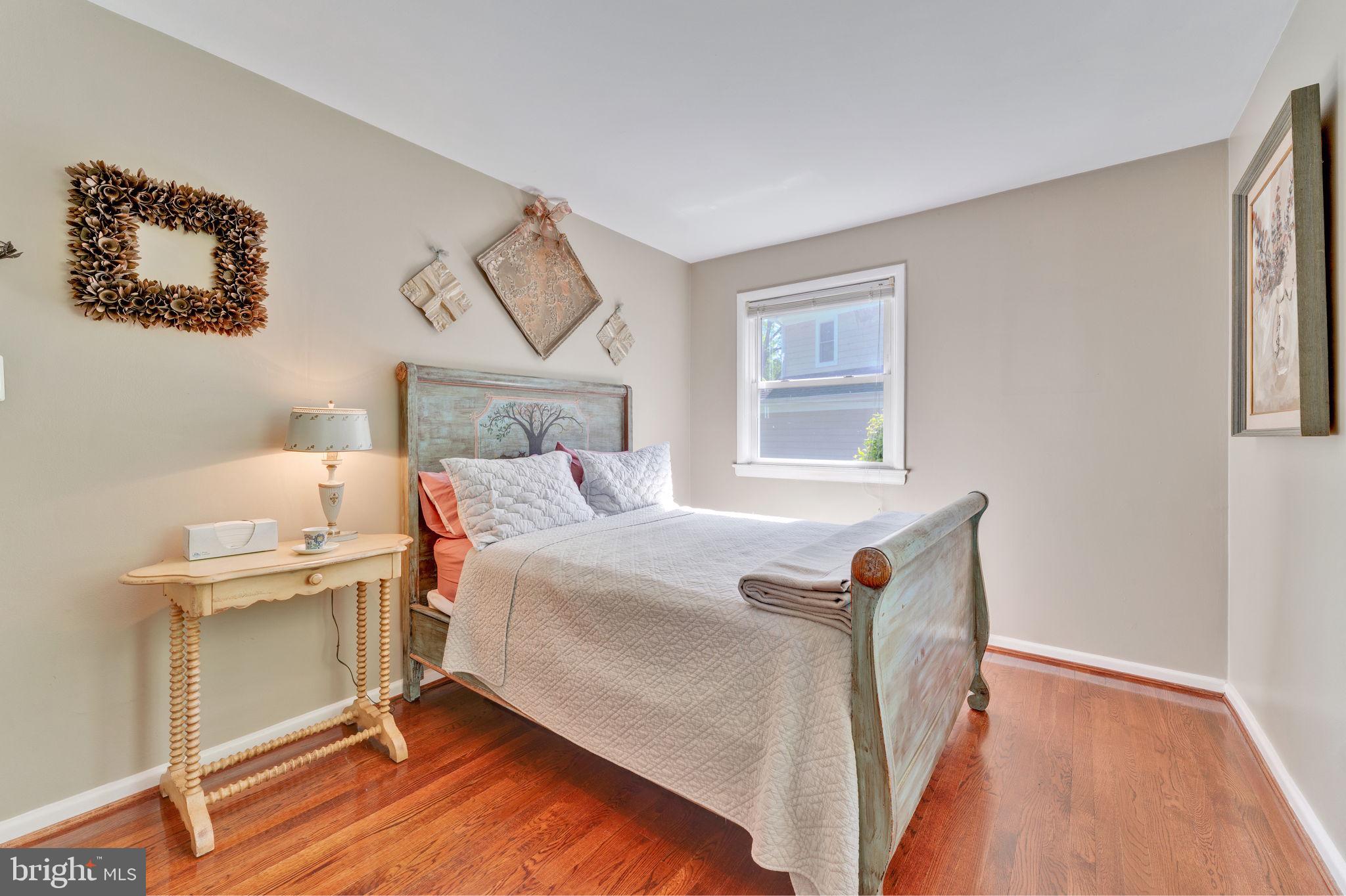 501 Ridge Road Southwest Vienna, VA 22180 - Photo 28 of 54 a bed room with a bed and a window