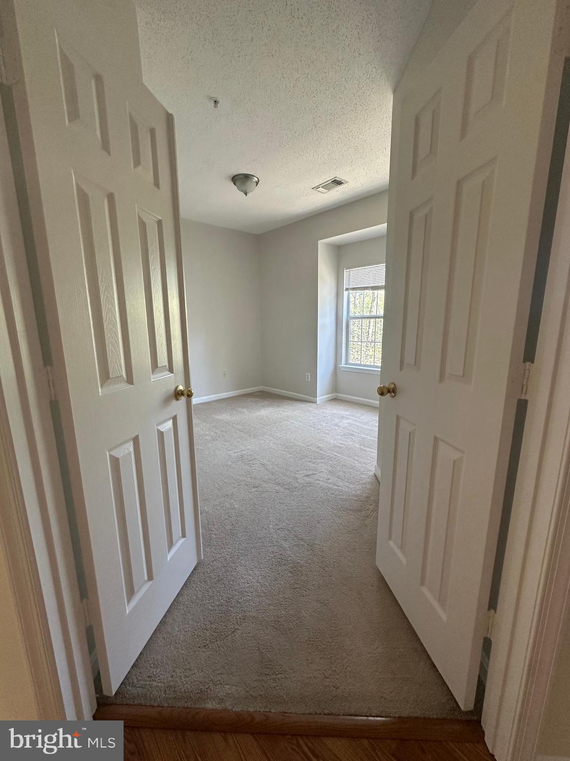 1705 Lake Shore Crest Drive, Unit 23 Reston, VA 20190 - Photo 16 of 45 a view of a hallway with staircase