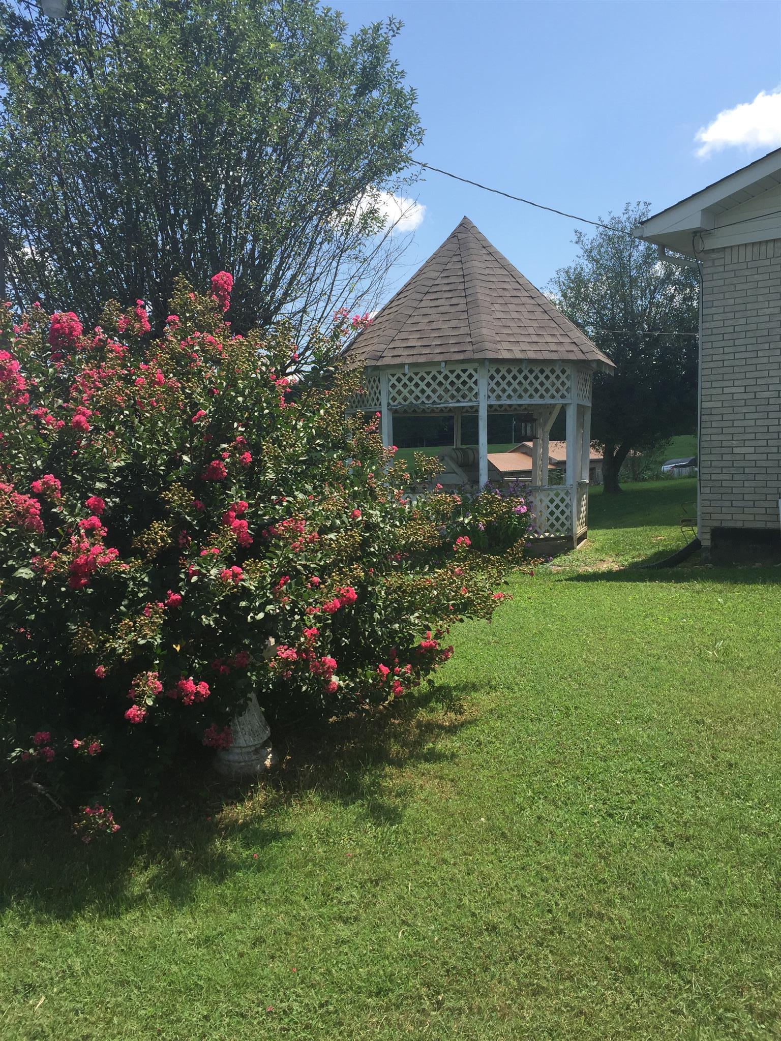 640 Gamaliel Road Red Boiling Springs, TN 37150 - Photo 5 of 16 Gazebo and pretty landscaping