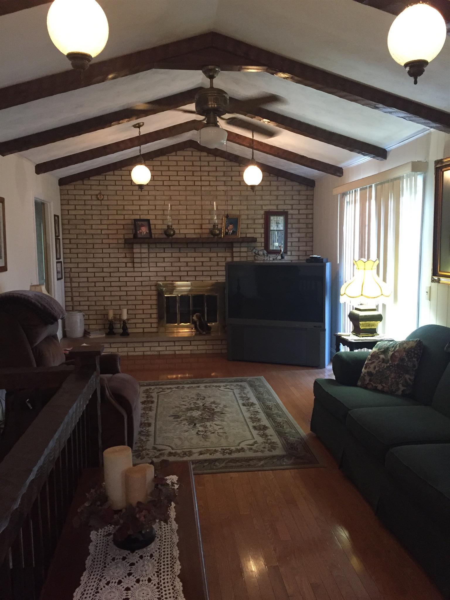 640 Gamaliel Road Red Boiling Springs, TN 37150 - Photo 8 of 16 Den is off kitchen