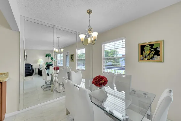 a kitchen with stove and cabinets
