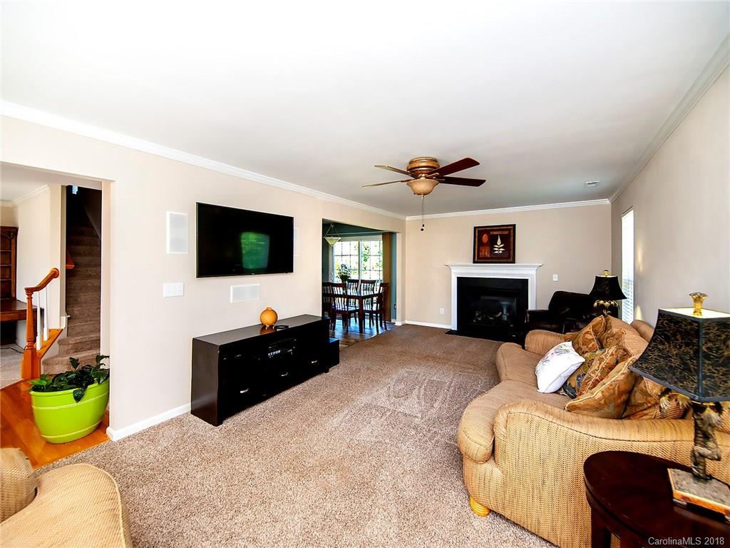 631 Eaton Court Fort Mill, SC 29708 - Photo 3 of 15 a living room with furniture and a flat screen tv