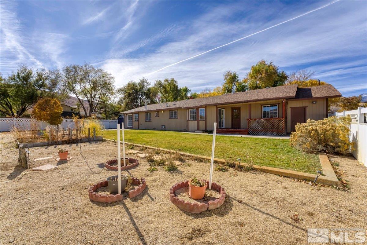 155 Andrew Lane Reno, NV 89521 - Photo 20 of 35 a view of a house with backyard and sitting area