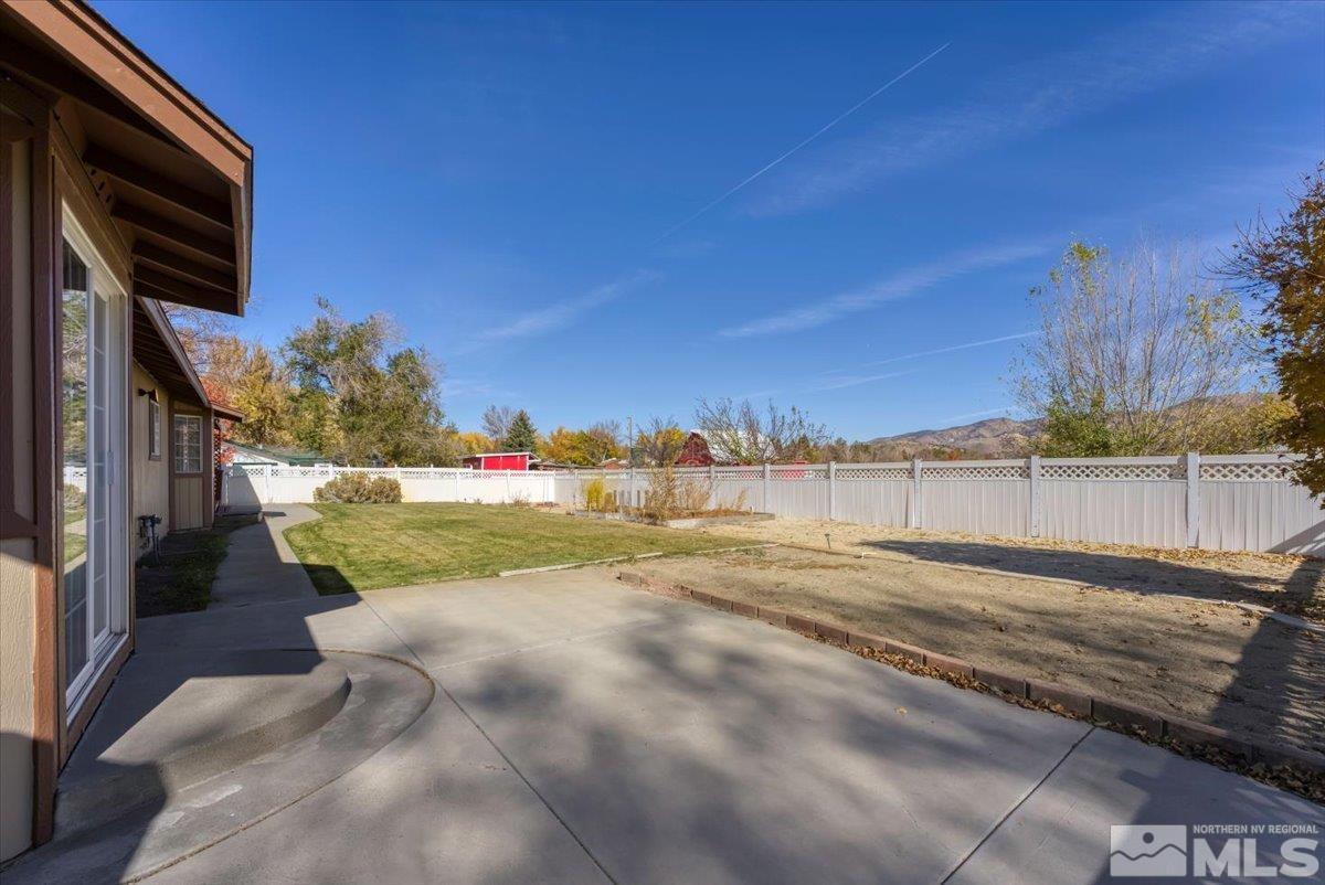 155 Andrew Lane Reno, NV 89521 - Photo 26 of 35 a view of swimming pool with a yard