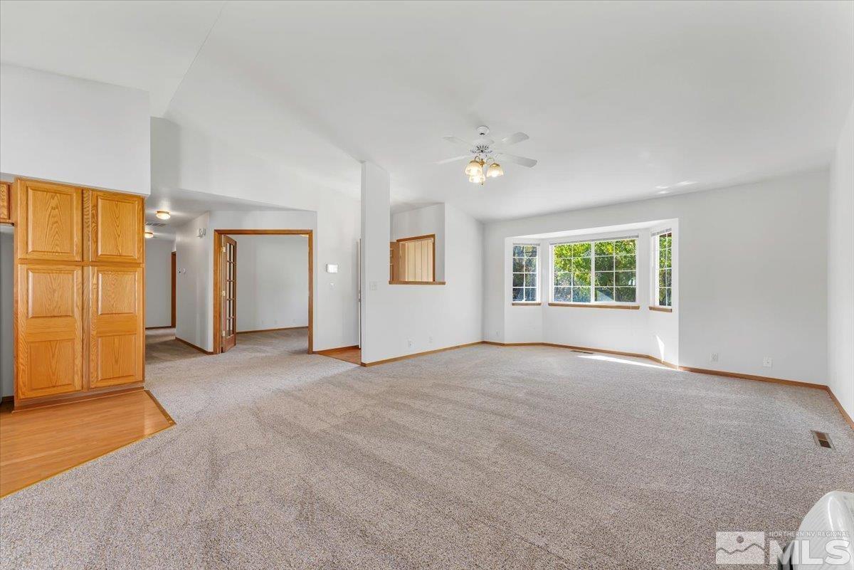 155 Andrew Lane Reno, NV 89521 - Photo 3 of 35 an empty room with windows and closet