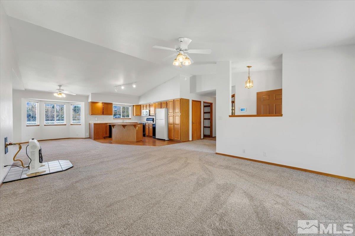 155 Andrew Lane Reno, NV 89521 - Photo 5 of 35 a living room with furniture and kitchen view