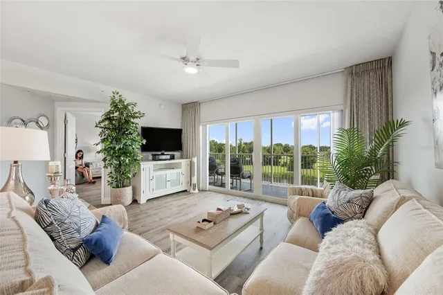 a spacious bedroom with a bed and a couch