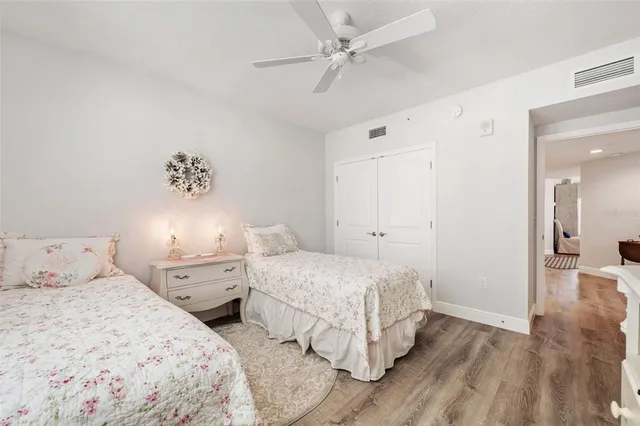a view of a livingroom with furniture and a potted plant