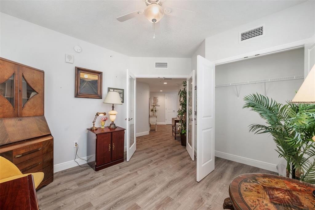 960 Starkey Road, Unit 8206 Largo, FL 33771 - Photo 38 of 71 a view of a livingroom with furniture and a potted plant