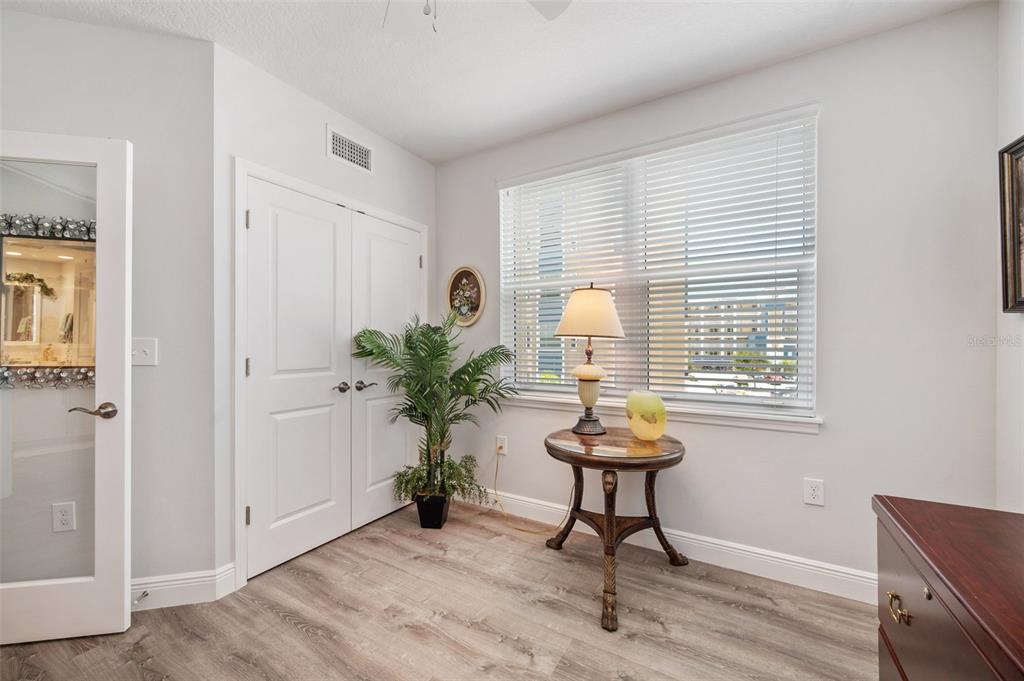 960 Starkey Road, Unit 8206 Largo, FL 33771 - Photo 39 of 71 a room with furniture and a potted plant