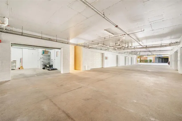 a view of a swimming pool with a patio and a garden