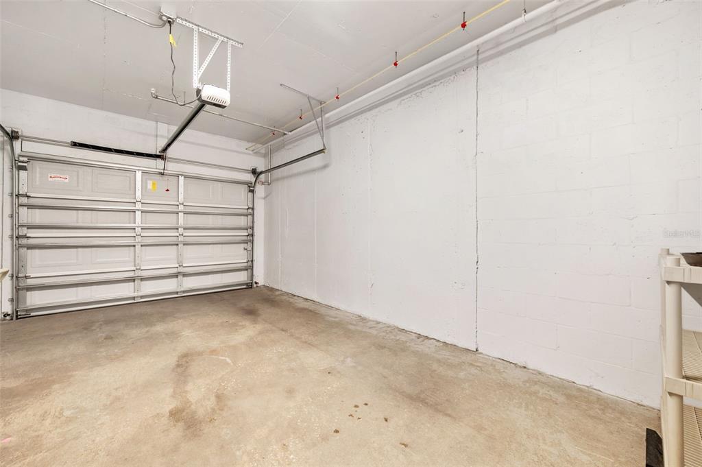 960 Starkey Road, Unit 8206 Largo, FL 33771 - Photo 52 of 71 a view of room that has a white bed