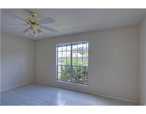7140 Everhart Road, Unit 3 Corpus Christi, TX 78413 - Photo 6 of 10 a view of an empty room with window and wooden floor