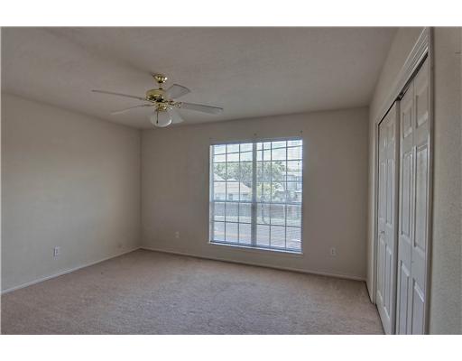 7140 Everhart Road, Unit 3 Corpus Christi, TX 78413 - Photo 8 of 10 a view of an empty room with a window