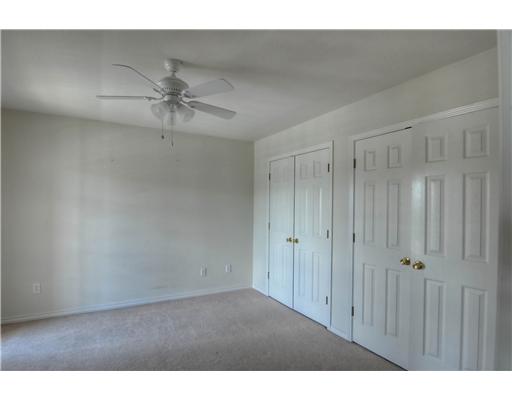 7140 Everhart Road, Unit 3 Corpus Christi, TX 78413 - Photo 9 of 10 a view of a big room with chandelier fan
