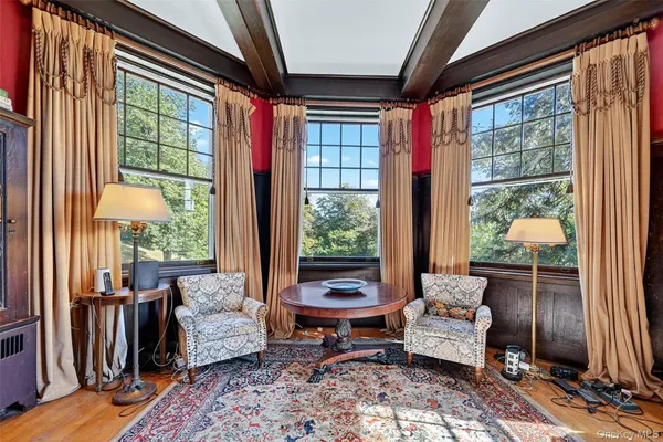 a living room with furniture and a window