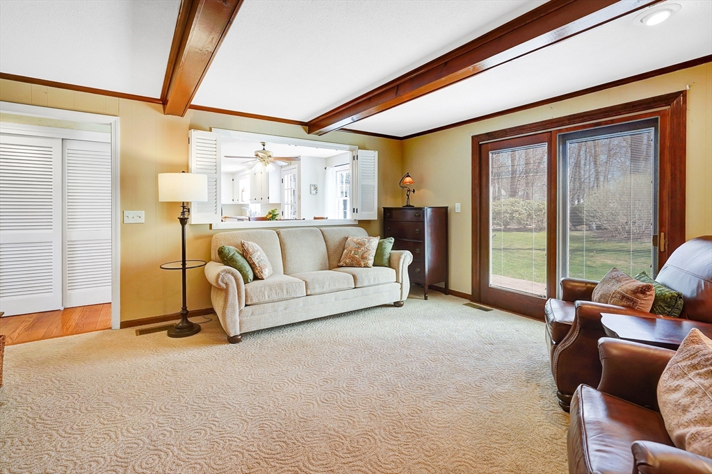 27 West Colonial Road Wilbraham, MA 01095 - Photo 5 of 42 a living room with furniture and a large window