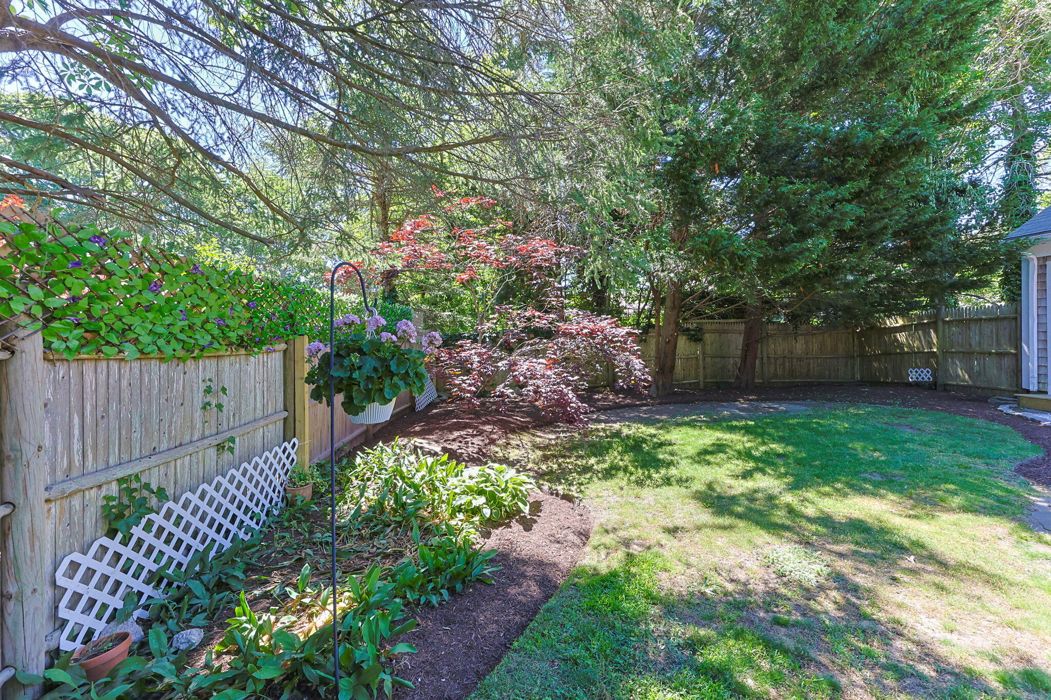 74 Taft Road West Yarmouth, MA 02673 - Photo 25 of 31 side yard with hanging planter
