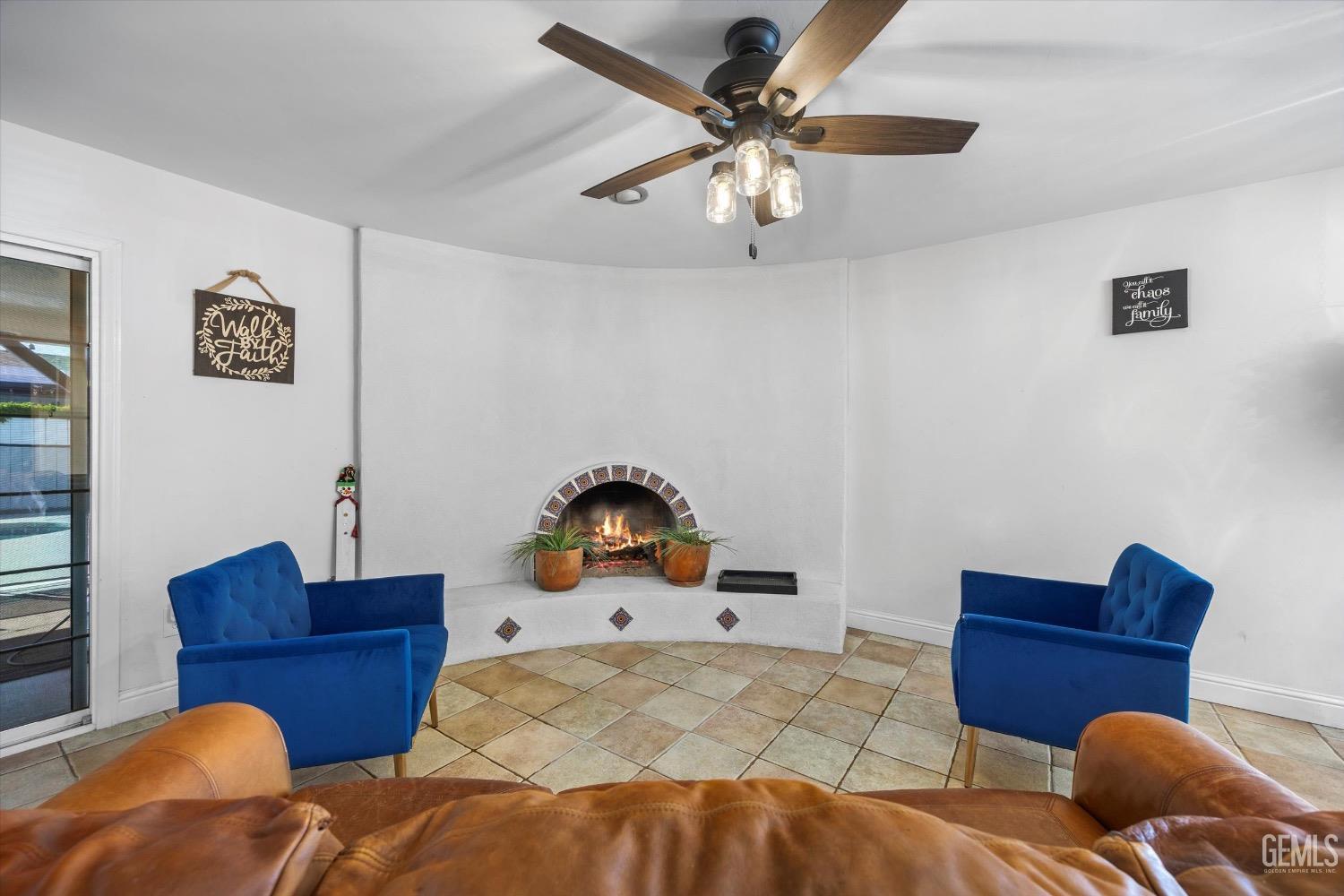 Undisclosed Address Bakersfield, CA 93309 - Photo 11 of 36 a bedroom with furniture and wooden floor