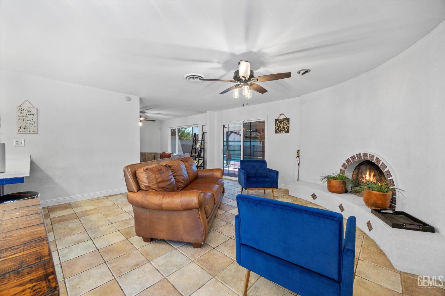 Undisclosed Address Bakersfield, CA 93309 - Photo 12 of 36 a living room with furniture