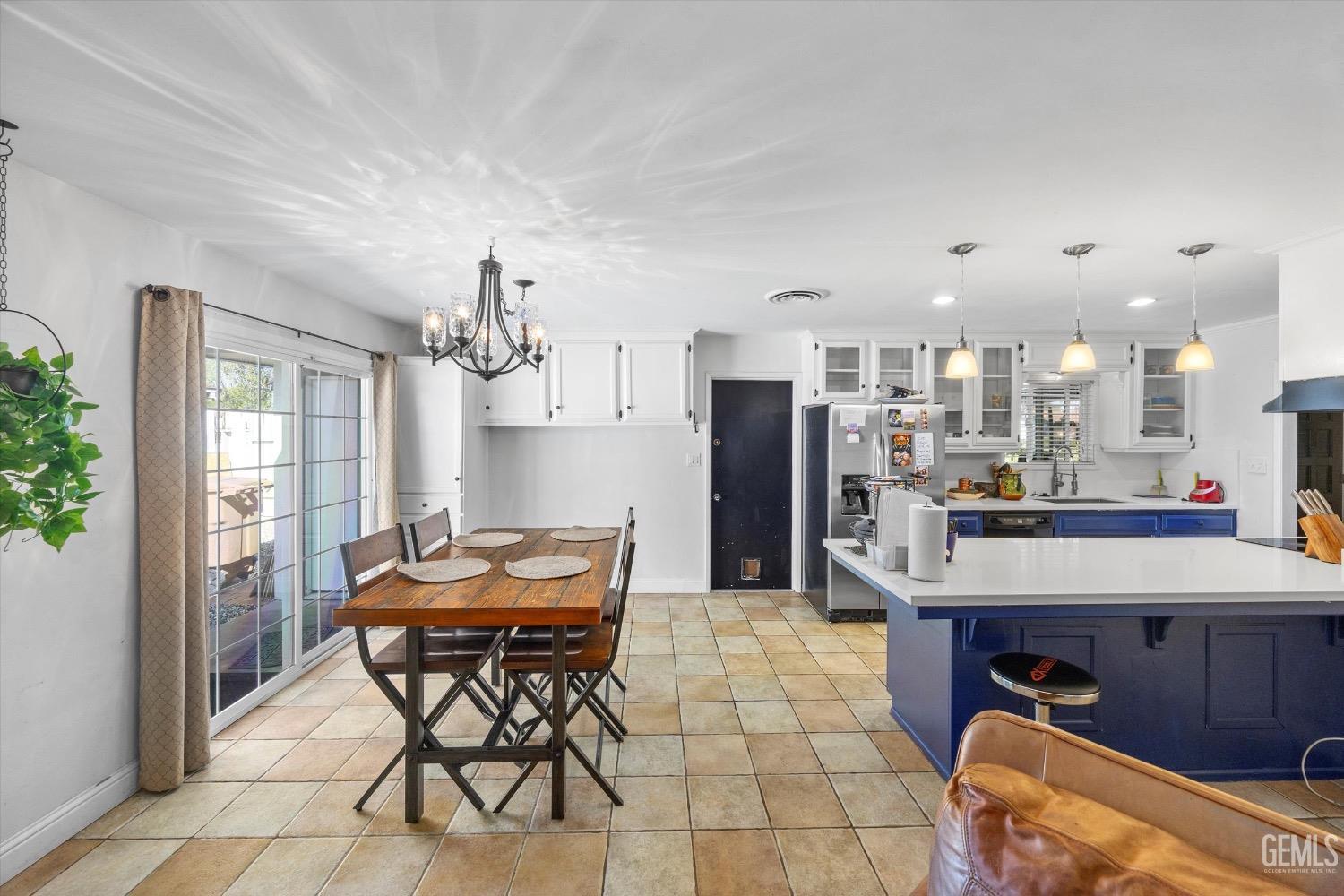 Undisclosed Address Bakersfield, CA 93309 - Photo 14 of 36 a view of a dining room with furniture and window