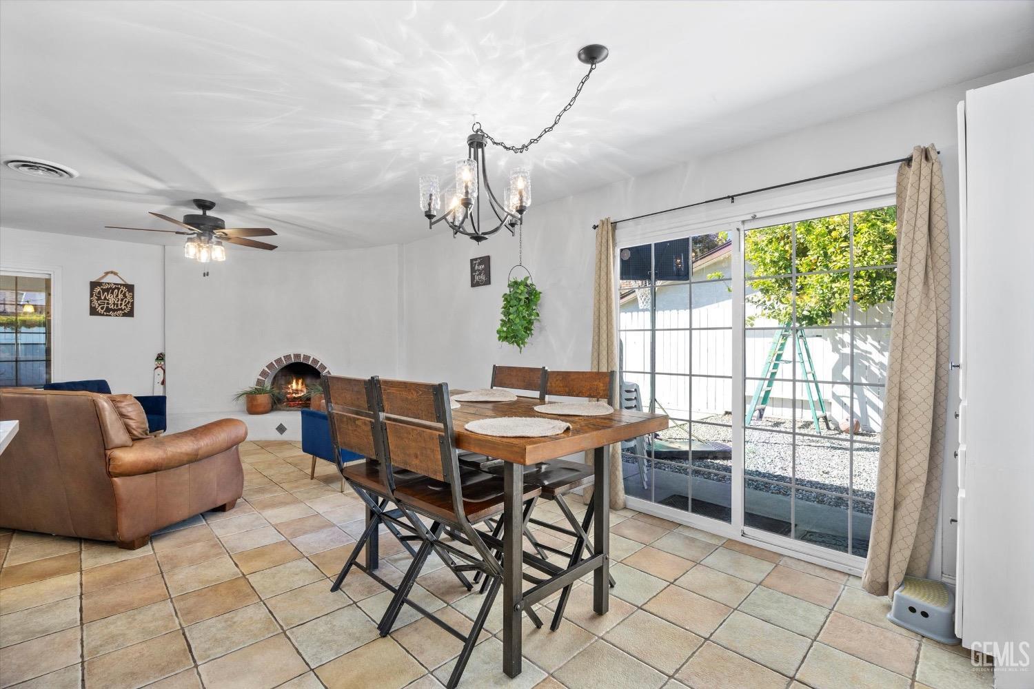 Undisclosed Address Bakersfield, CA 93309 - Photo 15 of 36 a view of a livingroom with furniture window and wooden floor