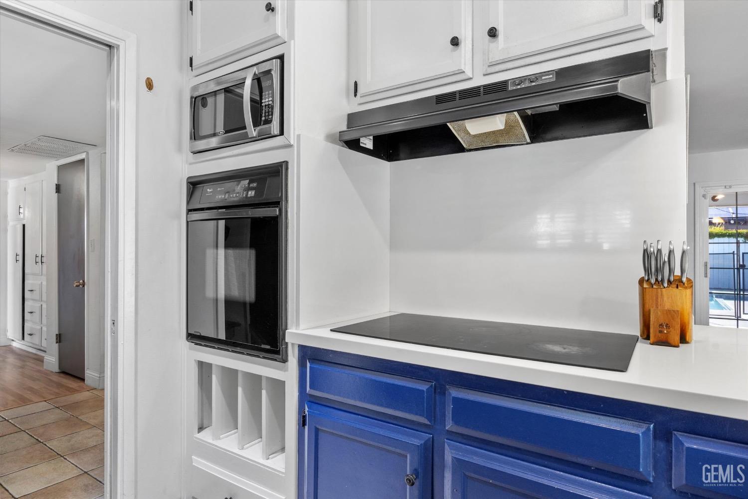 Undisclosed Address Bakersfield, CA 93309 - Photo 17 of 36 a kitchen with stainless steel appliances a refrigerator and a stove