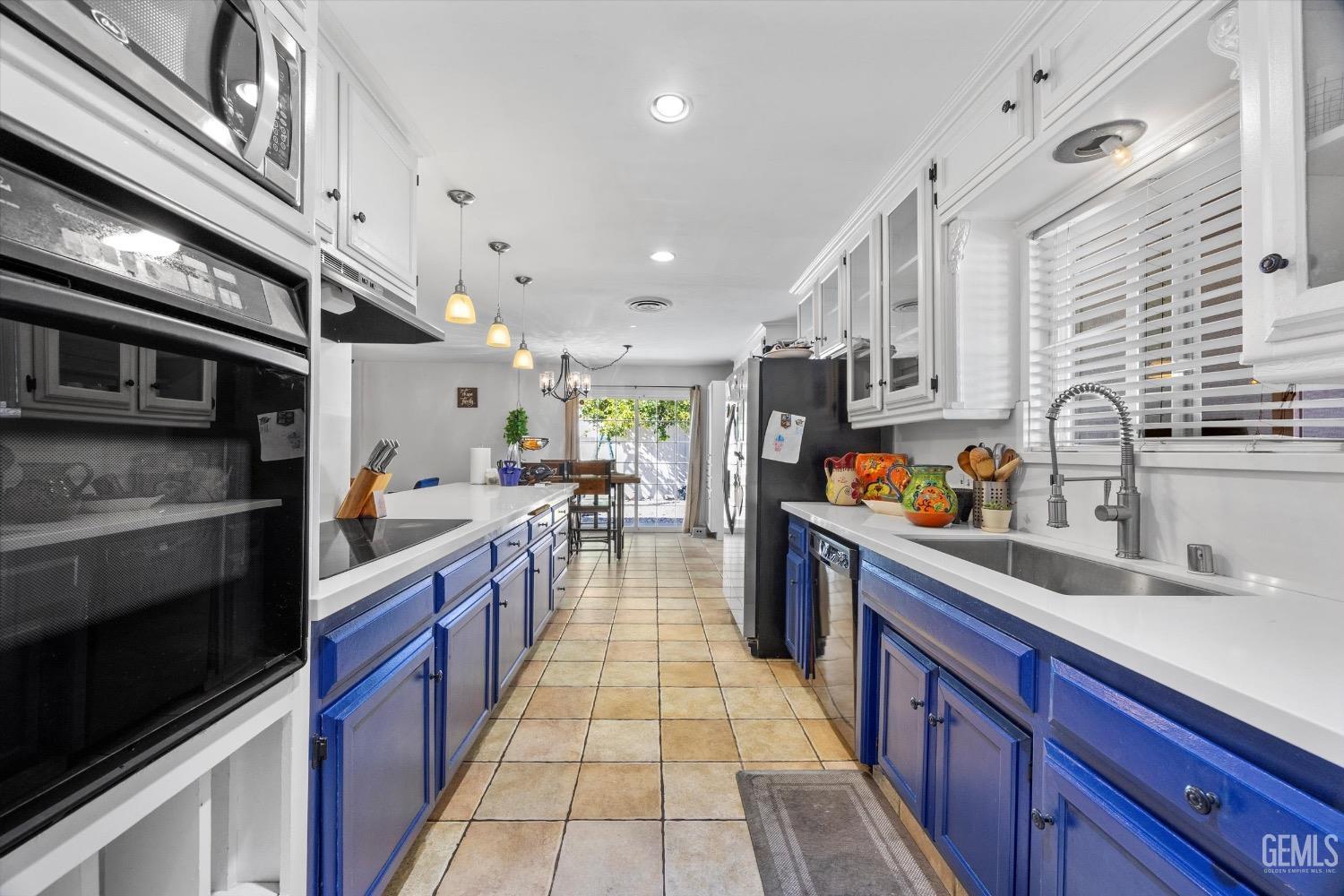 Undisclosed Address Bakersfield, CA 93309 - Photo 18 of 36 a large kitchen with stainless steel appliances lots of counter space and a sink