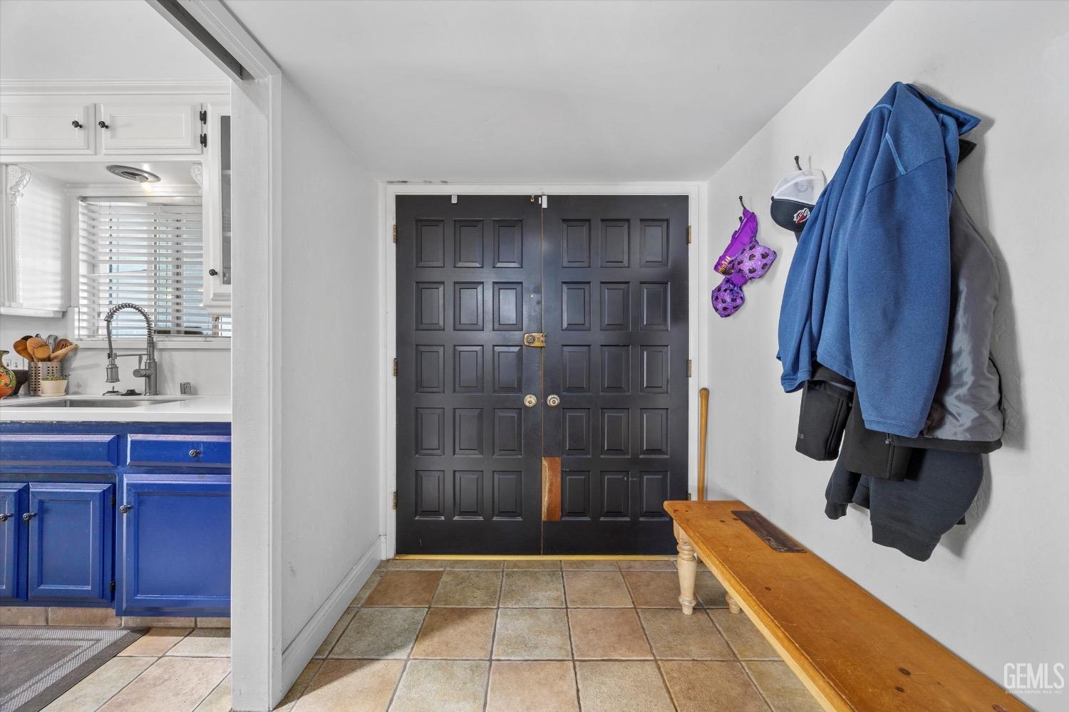 Undisclosed Address Bakersfield, CA 93309 - Photo 5 of 36 a view of walk in closet with clothes and shoes