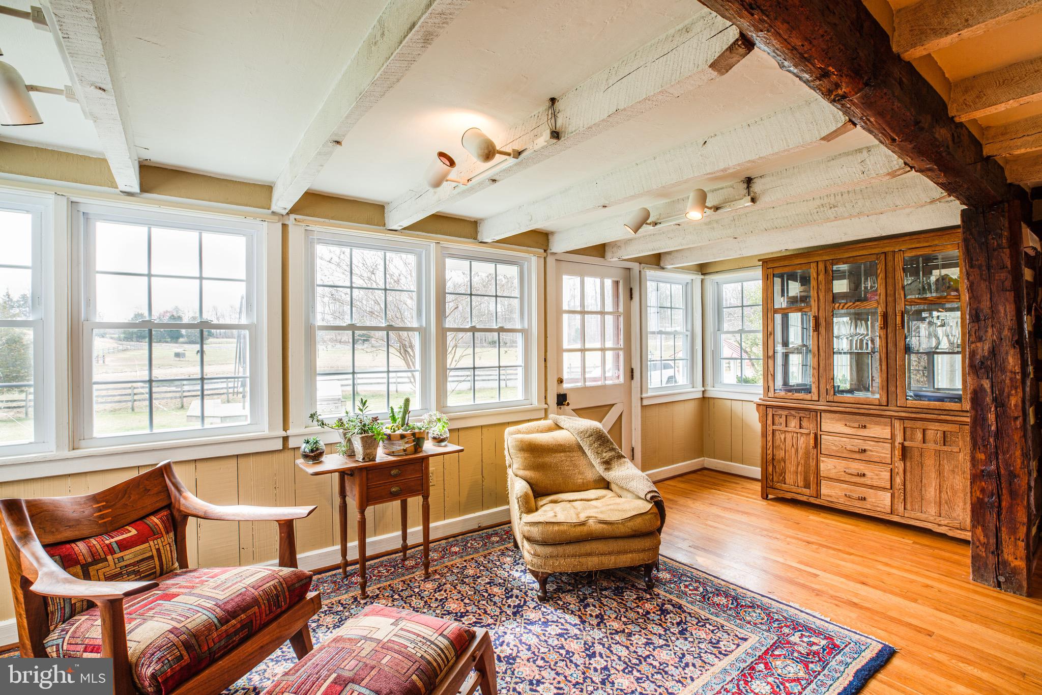 504 Poplar Road Fredericksburg, VA 22406 - Photo 19 of 61 Sunny windows add light & side door leads outside