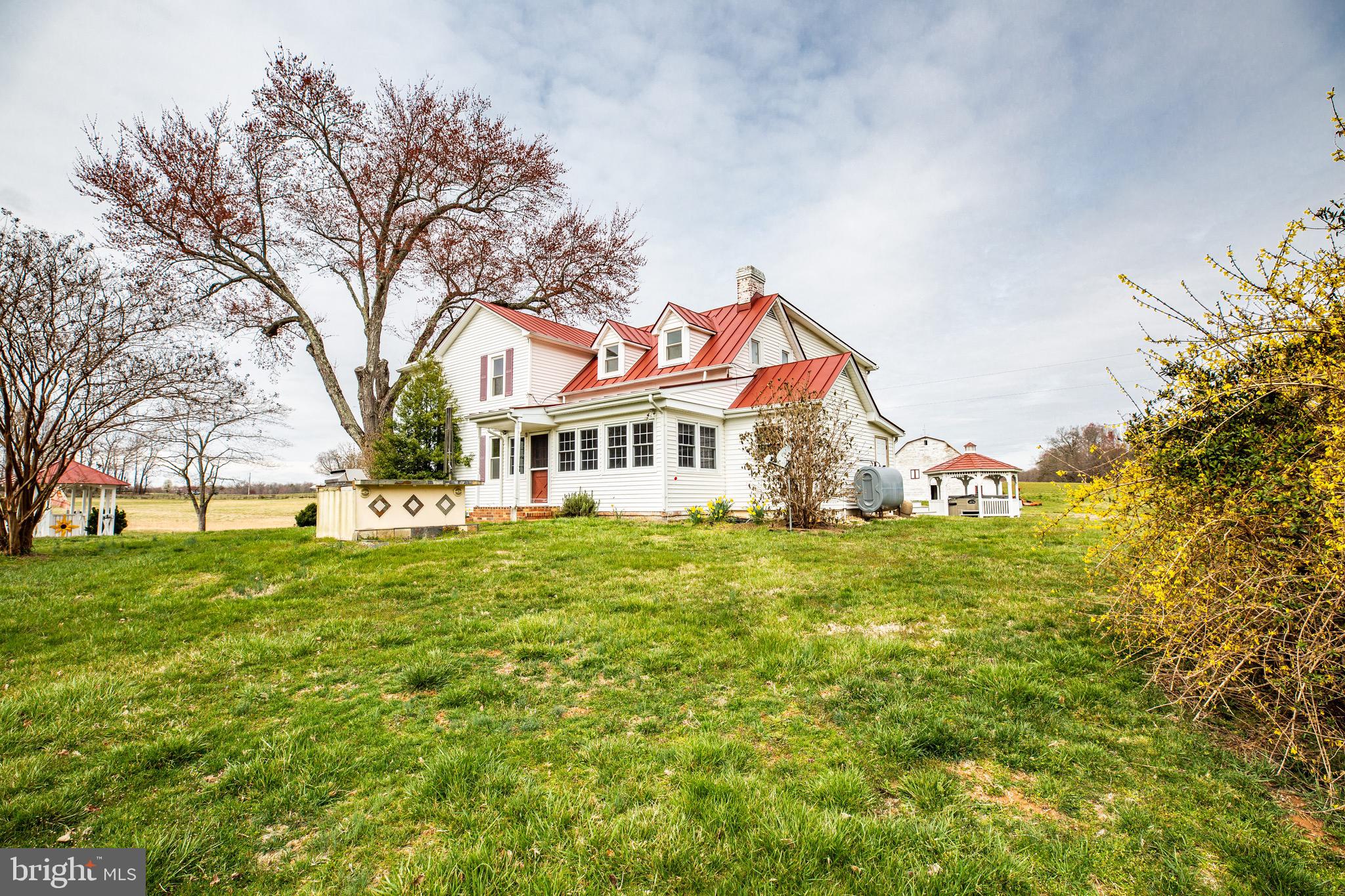 504 Poplar Road Fredericksburg, VA 22406 - Photo 46 of 61 The side view of this farm house is picturesque