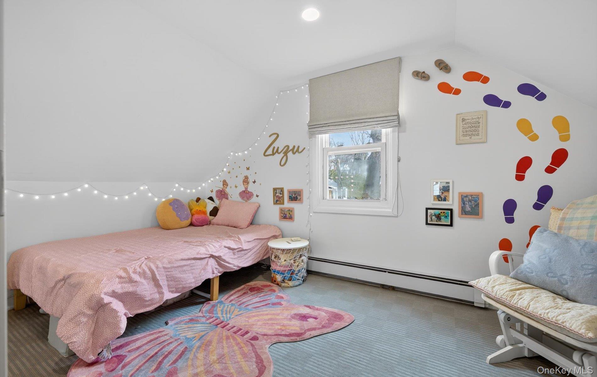 28 Harbor Road Port Washington, NY 11050 - Photo 15 of 22 a bedroom with a bed and a window