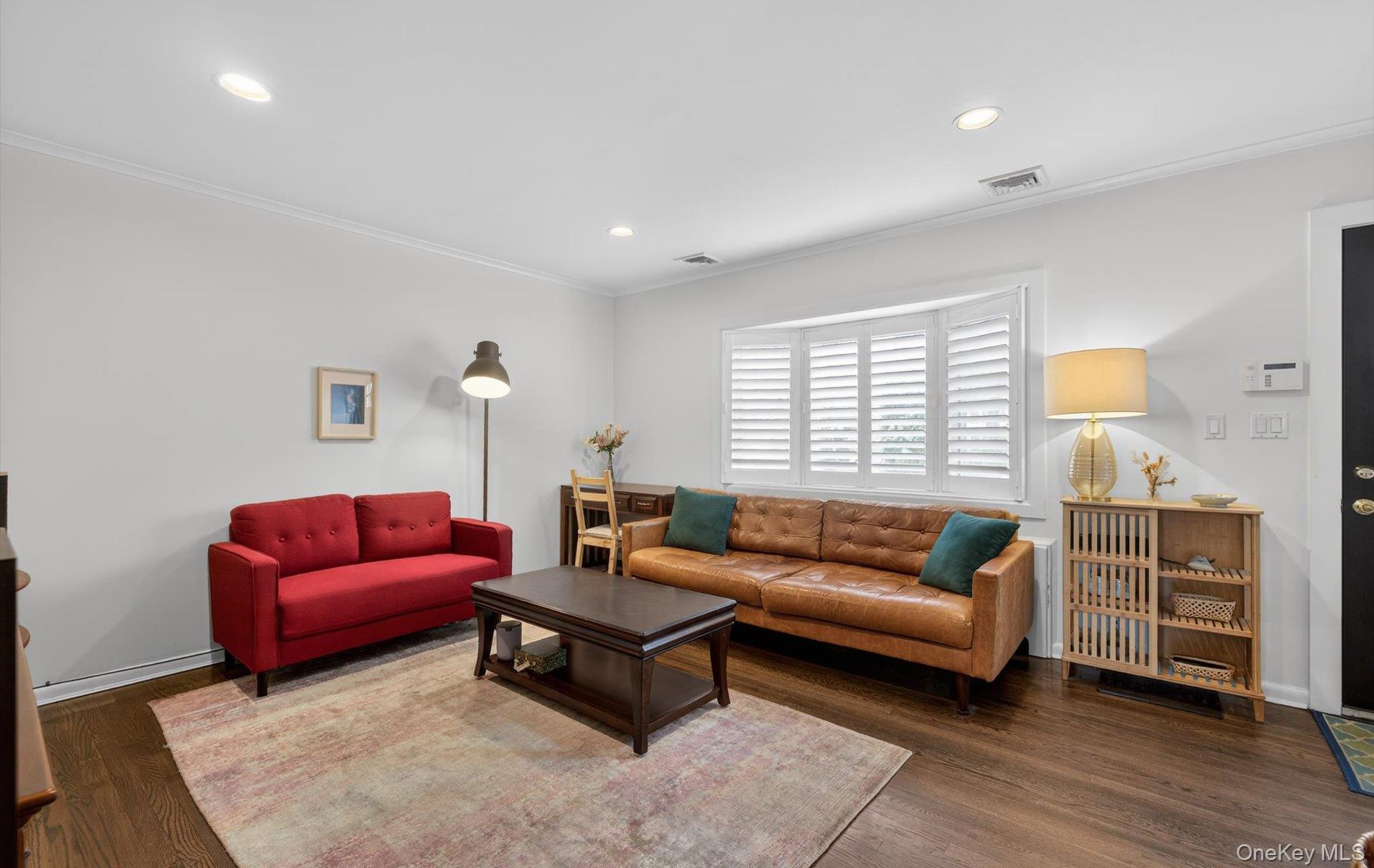 28 Harbor Road Port Washington, NY 11050 - Photo 5 of 22 a living room with furniture and a couch