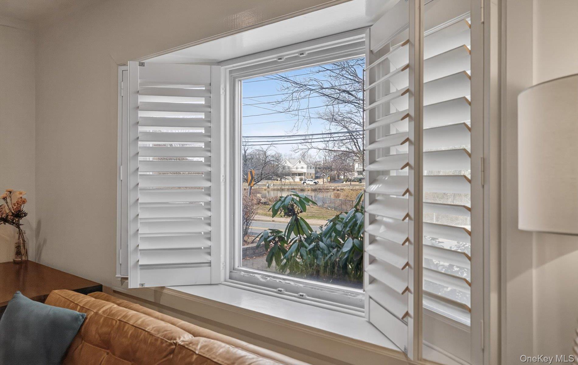 28 Harbor Road Port Washington, NY 11050 - Photo 6 of 22 a view of a bedroom with windows