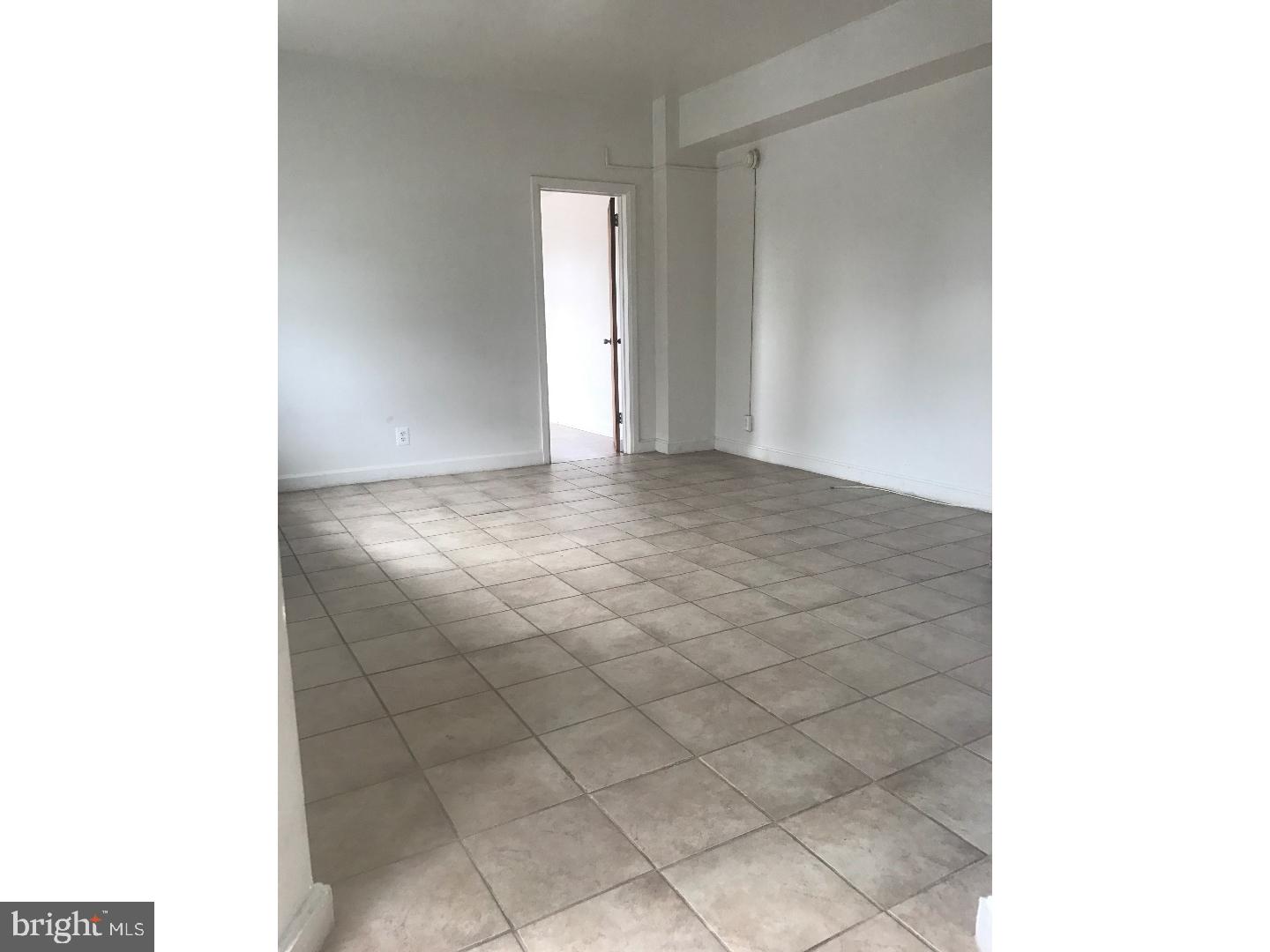 1321 Spruce Street, Unit 1E Philadelphia, PA 19107 - Photo 7 of 22 a view of an empty room