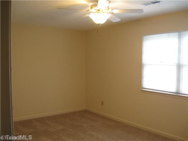 4912 Tower Road, Unit A Greensboro, NC 27410 - Photo 6 of 12 Master Bedroom.
