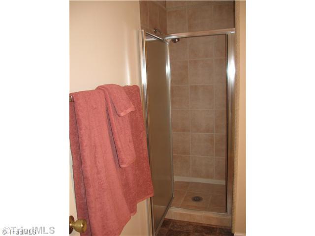 4912 Tower Road, Unit A Greensboro, NC 27410 - Photo 7 of 12 Bath. Walk-in shower off of Master