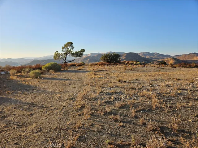 a view of a lake with a mountain in the background