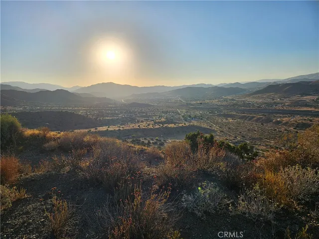 a view of lake with mountain
