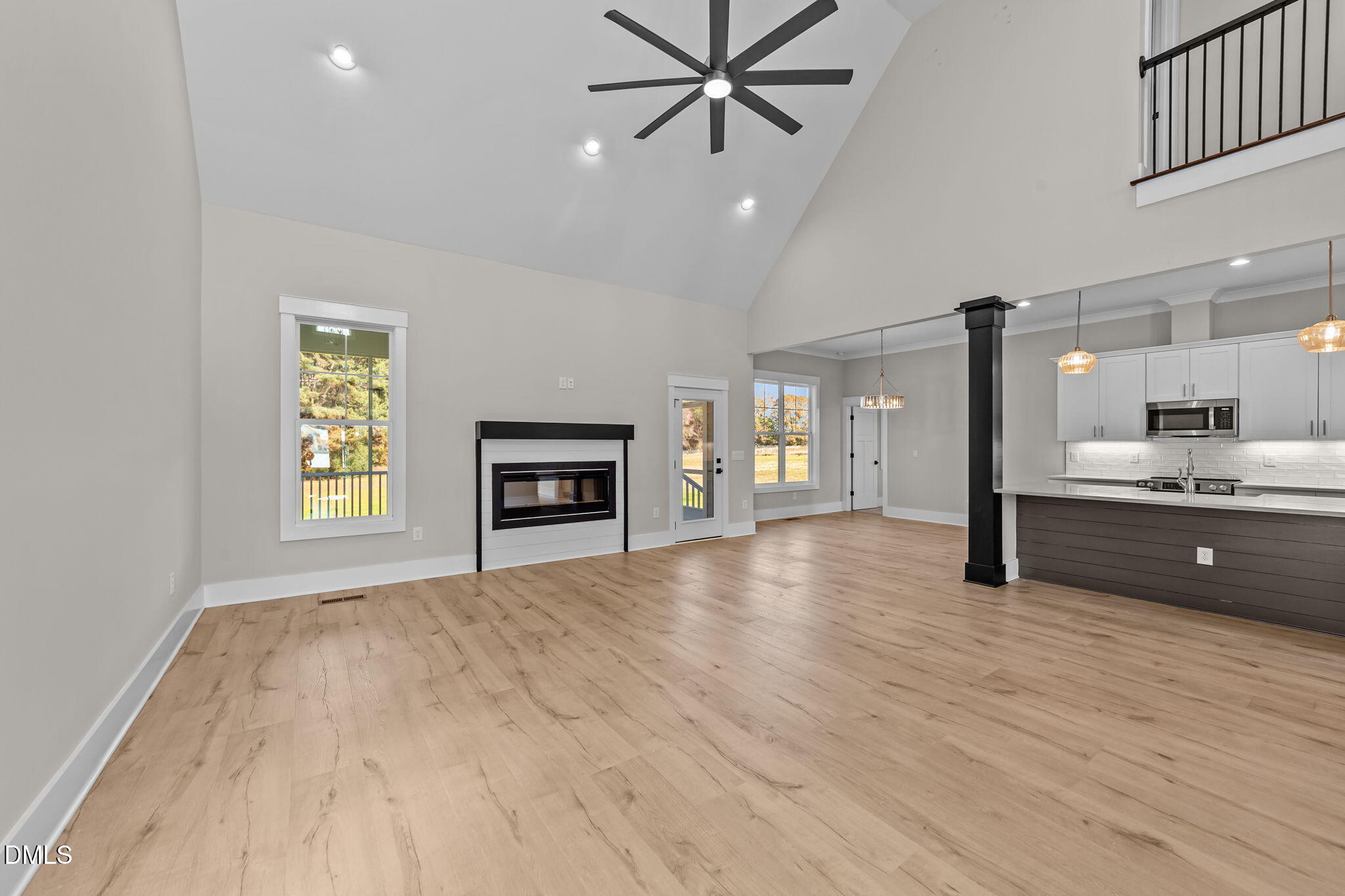 2568 Lassiter Road Four Oaks, NC 27524 - Photo 6 of 50 a view of an empty room with window and cabinet