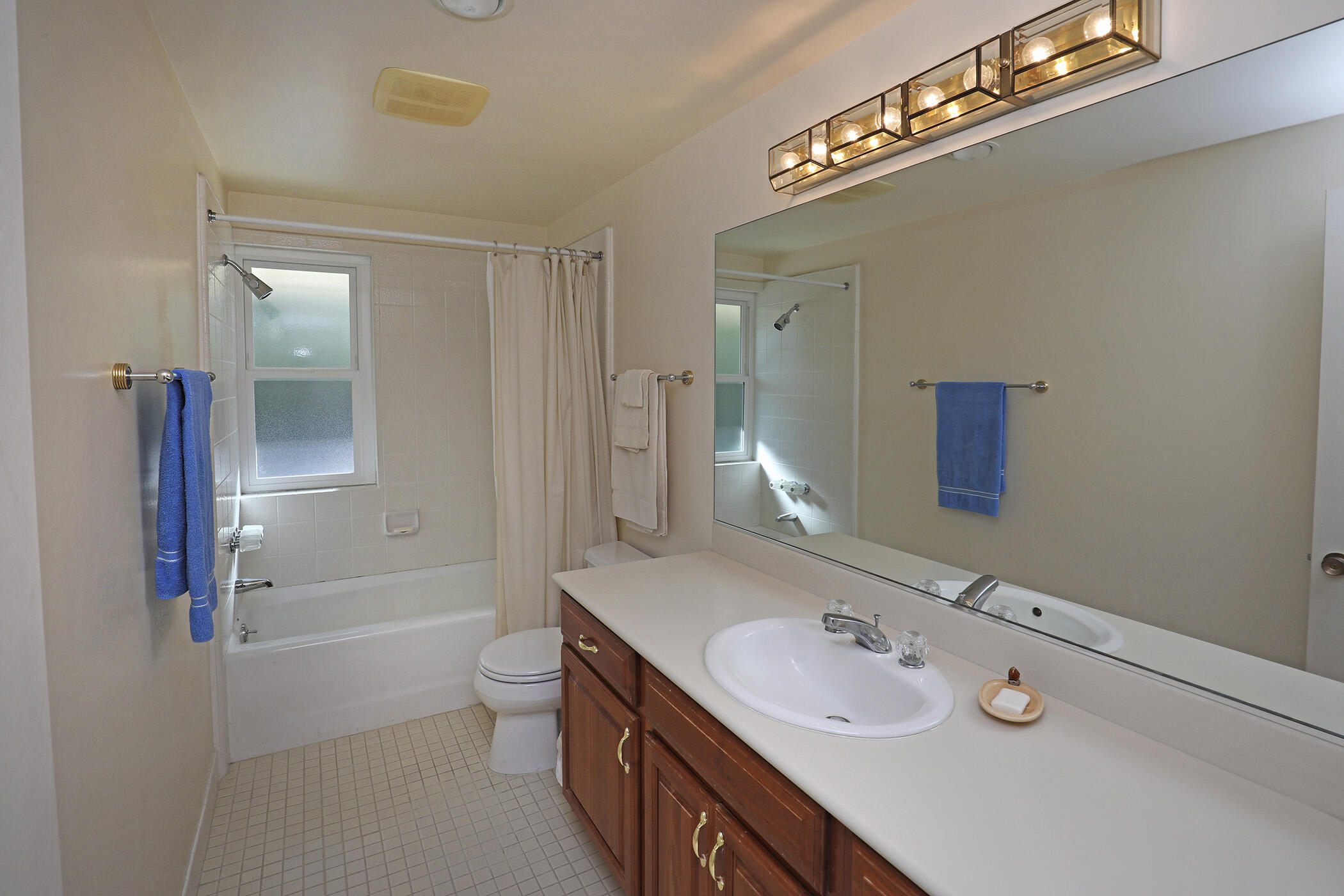 2805 Miradero Drive, Unit C Santa Barbara, CA 93105 - Photo 11 of 23 a bathroom with a double vanity sink a toilet and shower