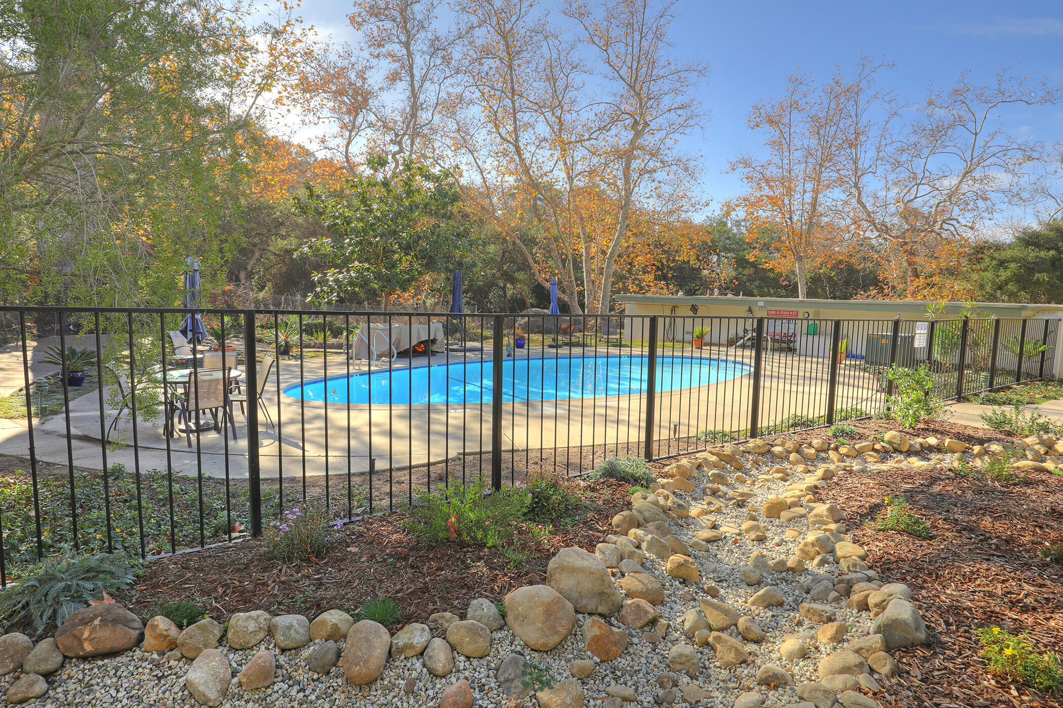 2805 Miradero Drive, Unit C Santa Barbara, CA 93105 - Photo 20 of 23 a view of a backyard with large trees