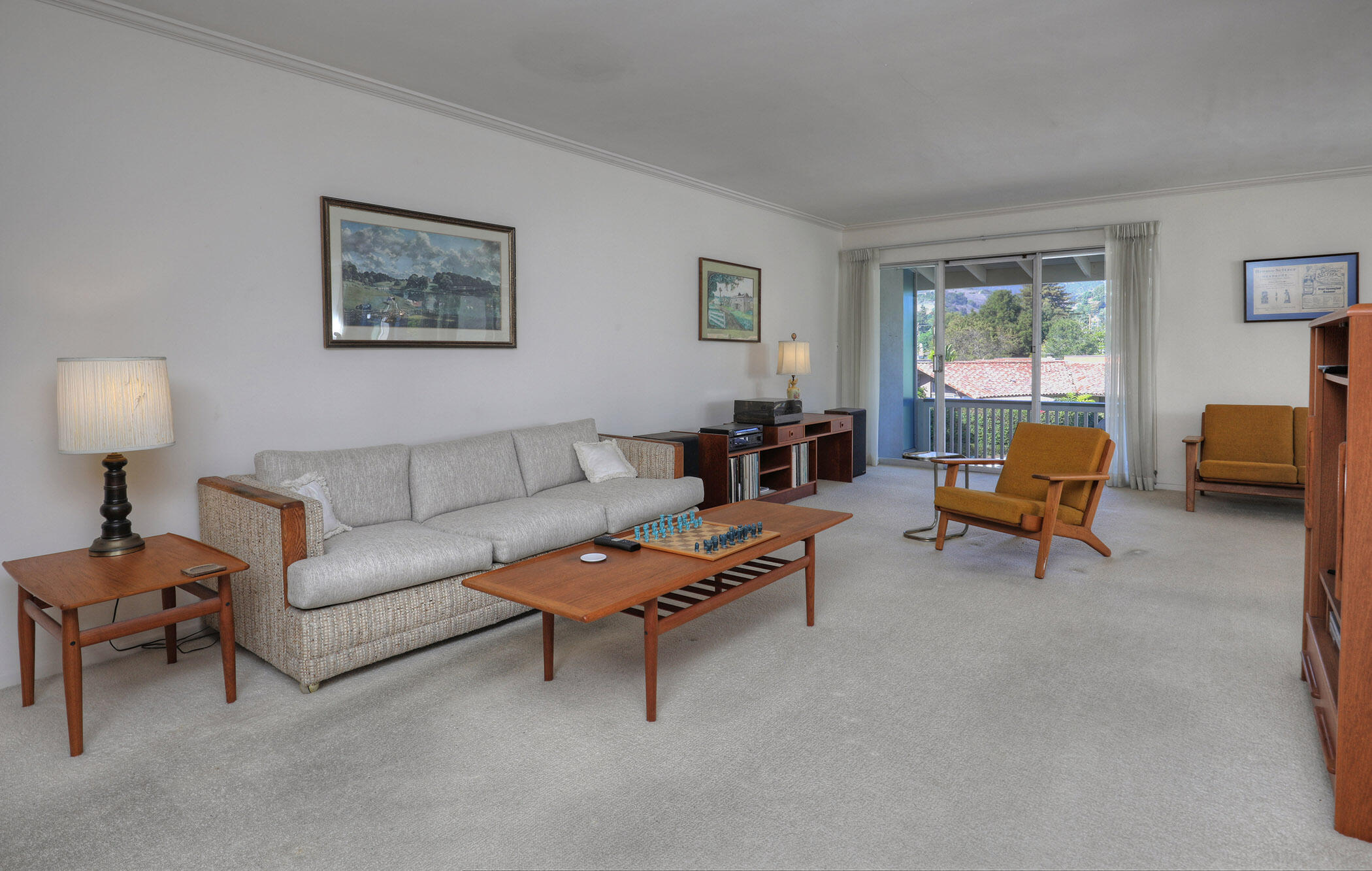 2805 Miradero Drive, Unit C Santa Barbara, CA 93105 - Photo 3 of 23 a living room with furniture and a lamp