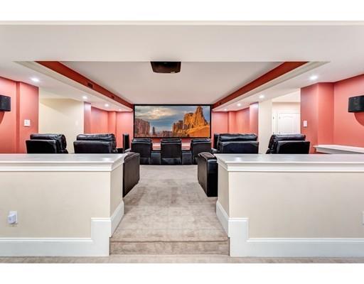 11 Bramble Lane Sharon, MA 02067 - Photo 24 of 30 a living room with stainless steel appliances kitchen island granite countertop a refrigerator a stove top oven and a sink