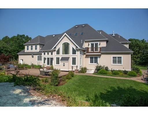 11 Bramble Lane Sharon, MA 02067 - Photo 29 of 30 a front view of a house with a yard